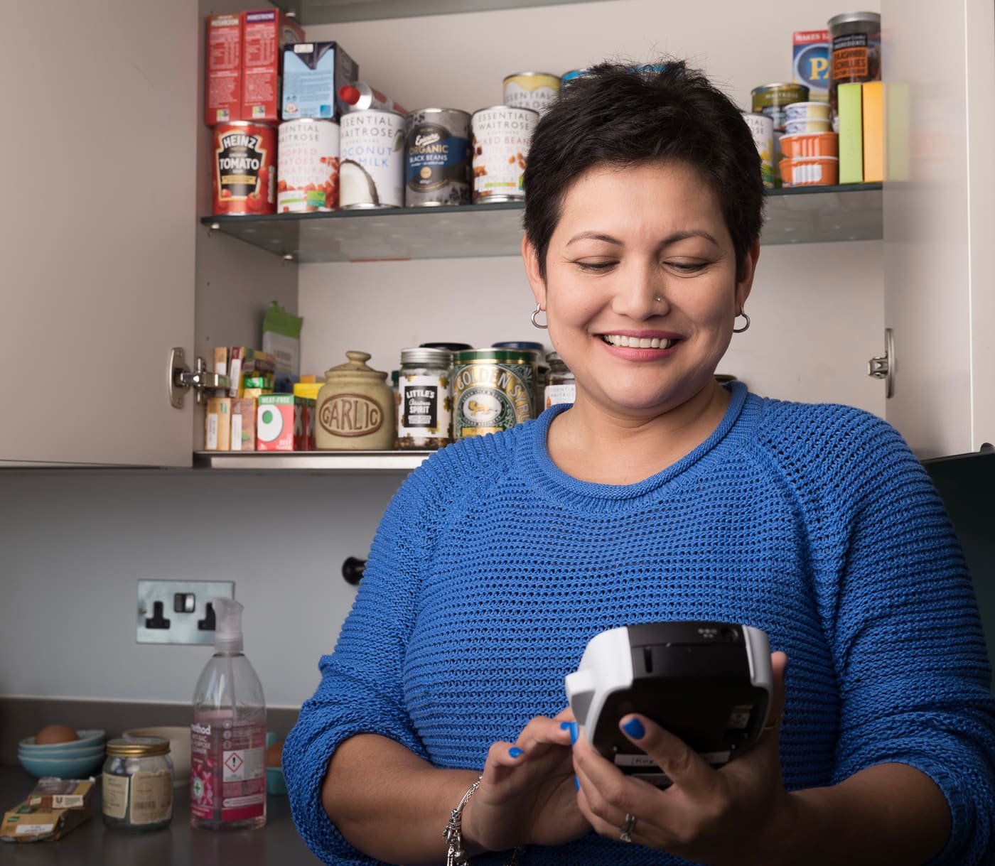 Karla organising a client’s kitchen